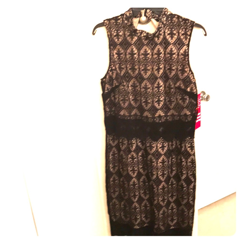 Beautiful size 12 lace black and nude dress..